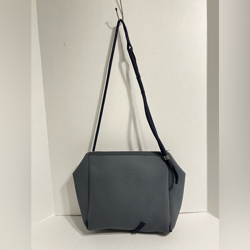 State of Escape Gray Crossbody Bag with Textured Leather and Modern Design